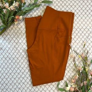 Athleta Salutation Stash Pocket II 7/8 Tight Leggings 531321 Orange Size Large L